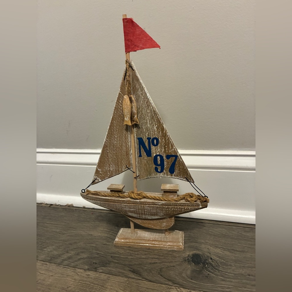 Wooden Sailboat Decor with Red and Blue Accents